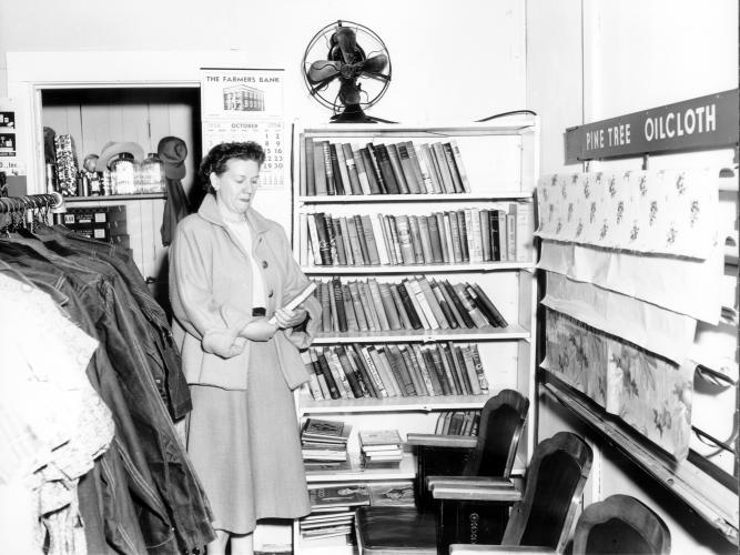 Gardner Self Service Library Mrs. Wilson Redman at the Gardner Self Service Library circa 1954