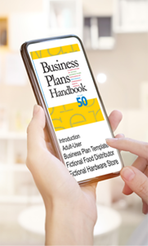 Closeup photo of a phone that has an article pulled up that reads, Business Plans Handbook. One hand holds the phone and the other points to click content.