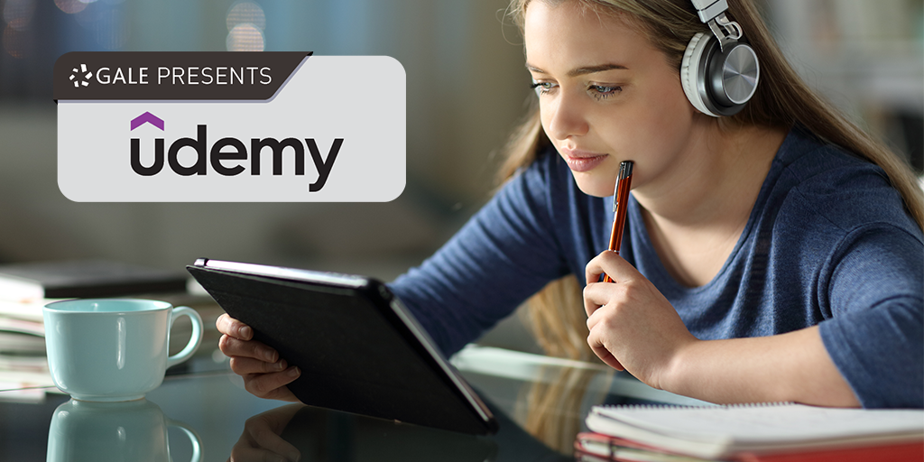 Udemy The Udemy logo with an image of a student reading on her tablet
