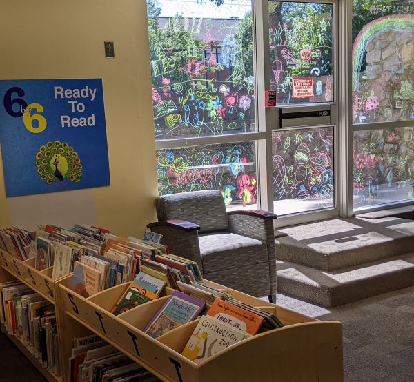 an image of painted windows in the children's section of Corinth library