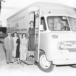 Board members with bookmobile Bookmobile with Library Board members Ira Bales (first Chairman), Mrs. Mark (Kay) Robeson, Mrs. Orville (Dorothy) Hoff, Mrs. Irven (Dorothy) Snyder, and Miss Shirley Brother (first County Librarian)