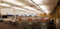 Plastic Traps cover stacks and furniture at Central Plastic covering installed over stacks and furniture at Central.