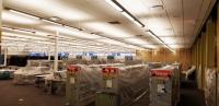 Plastic covering installed over stacks and furniture at Central.