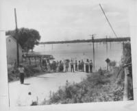 	 Sightseers survey the 1951 flood south of Bonner Springs, Kansas.