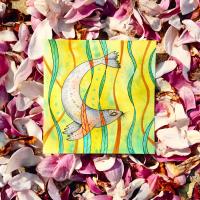 Watercolor painting of a seal and sea grass on a yellow background set on top of pink flower petals.