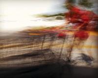 Photograph blurred landscape with red.