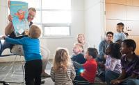 A librarian reads to children in Storytime