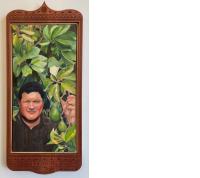 Framed painting of a man in front of an avocado tree.