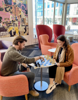 Staff playing chess at Lenexa
