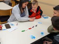 a family plays a game of Get Bit