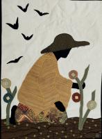 Textile of a woman kneeling in a garden.