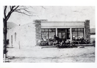 First commercial building: grocery, cigar store and confectionary