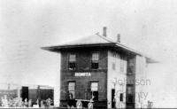 Black and white photo of a two story Bonita train depot