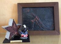 m.o.i. "Tin Star, Eagle, and T-Rex" (re-purposed objects, aluminum, pecans, & glue)