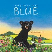Baby Bear Sees Blue baby bear sitting in flowers