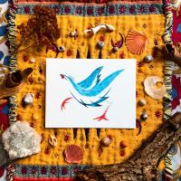 Watercolor painting of a bird set on top of an orange quilt and decorated with shells.