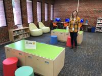assistant branch manager Megan Clark stands in the new kids area