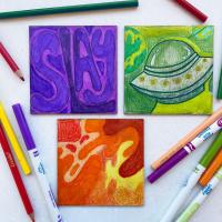 Free Draw Three different pieces of art. They are framed by markers and color pencils.