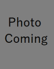 Photo coming written in a gray square